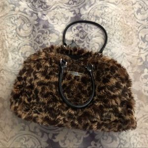 Leopard print "trumpette" baby bag/ diaper bag.